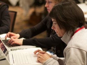 person using writing software on a laptop
