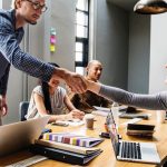 modern tech workspace with developers collaborating on AI projects