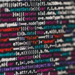 professional person optimizing LinkedIn profile on computer