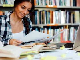 research assistant working with AI technology in a modern office