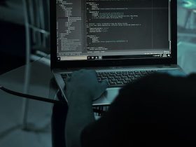 person creating an online course with AI on a computer