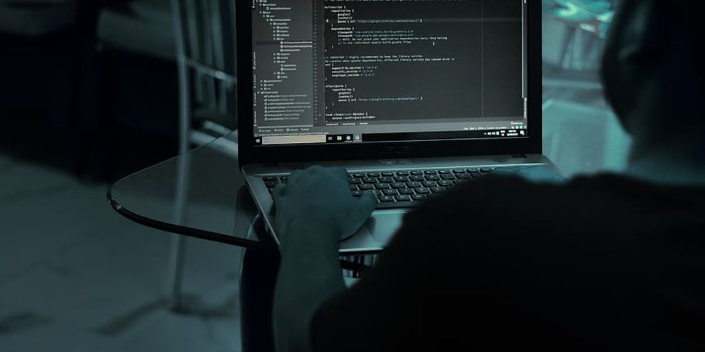 person creating an online course with AI on a computer